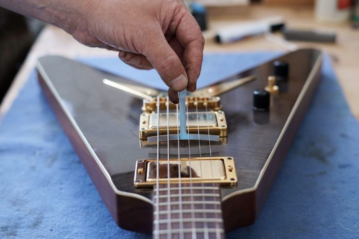 How To Adjust Action On An Electric Guitar There are 2 Ways