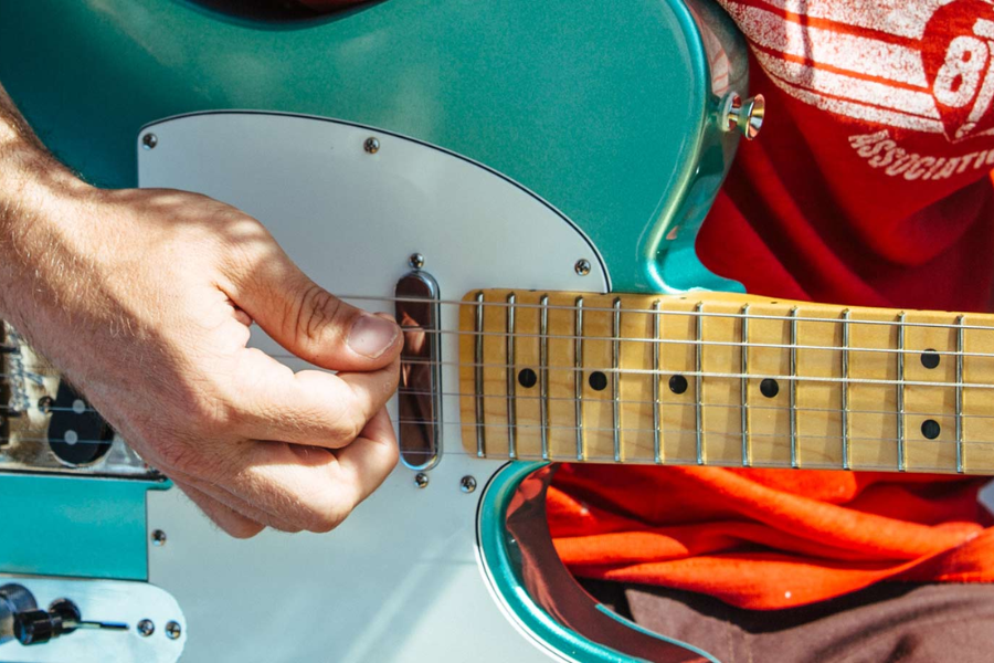 The electric guitar is often paired with a pick