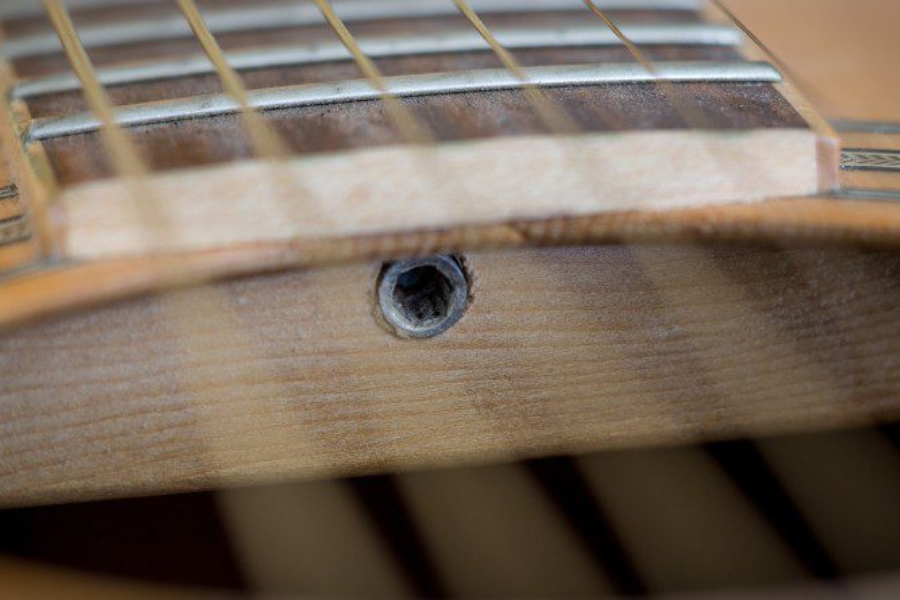 Where to find your guitar's truss rod adjustment :